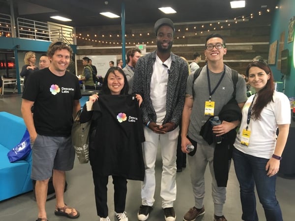 Sam Skillman (left) and Daniela Moody of Descartes Labs (right) and team Morrocin (middle) who developed a farm health monitoring site for subsistence farmers using our imagery layers